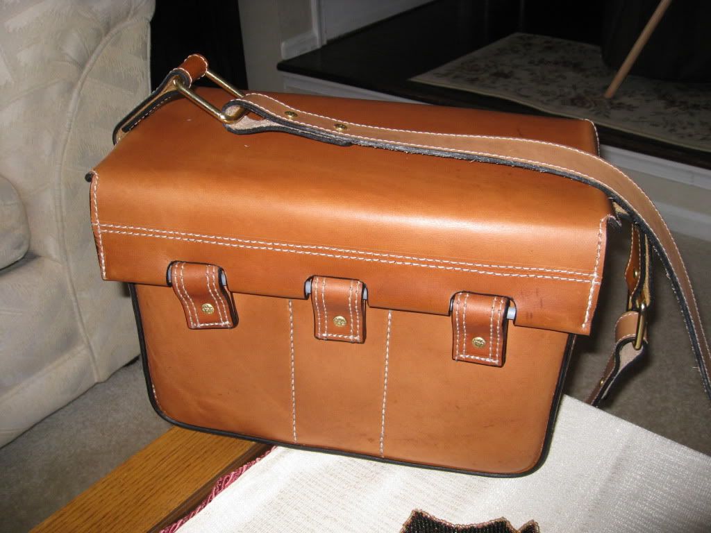 • leather shooting bag and pouch by Donny Weaver