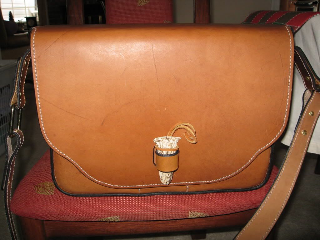• leather shooting bag and pouch by Donny Weaver